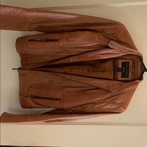 Genuine leather jacket. Brown.